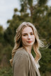 © MeganMahoneyPhotos - Pretty Young Beauty Woman Model with Gorgeous Long Blond Hair Blowing in the Wind Smiling for Portrait Shots Outside at the Park