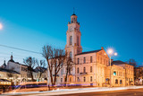 Fototapeta Miasto - Vitebsk, Belarus. Traffic At Lenina Street And City Hall In Evening Or Night Illumination At Winter
