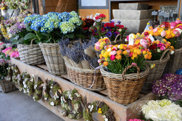 Flowers bar with variety of fresh beautiful flowers such as persian buttercups, anemone coronaria, lavender, hydrangea macrophylla for your interior flower decorations at the greek garden shop.