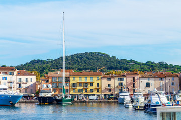 Wall Mural - Boats and luxury yachts in por of Saint Tropez, France