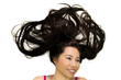 © Nutt - Closeup portrait of happy asian women  lying on ground with black long hair. acting smile, fun,