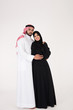 © Mahmoud Rahall - Arab couple standing on white background
