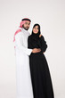 © Mahmoud Rahall - Arab couple standing on white background