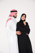 © Mahmoud Rahall - Arab couple standing on white background