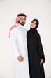 © Mahmoud Rahall - Arab couple standing on white background
