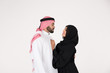 © Mahmoud Rahall - Arab couple standing on white background