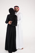 © Mahmoud Rahall - Arab couple standing on white background