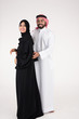 © Mahmoud Rahall - Arab couple standing on white background