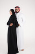 © Mahmoud Rahall - Arab couple standing on white background