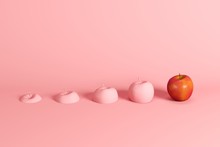 Outstanding Fresh Red Apple And Slices Of Apple Painted In Pink On Pink Background. Minimal Fruit Idea Concept.