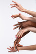 © Viacheslav Yakobchuk - Hands of powerful diverse women with different skin color