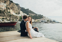 Young Wedding Couple Having Fun Time  In Italy.