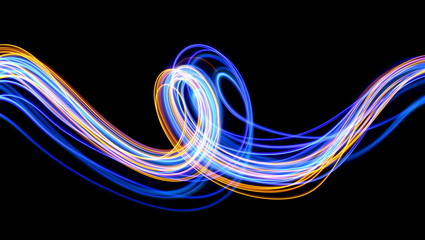 Wall Mural - Light painting photography, blue and gold loops and swirls of vibrant color, long exposure photo of fairy lights against a black background