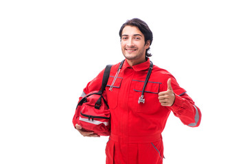 Young paramedic in red uniform isolated on white 