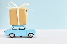 Happy Fathers Day Concept, Blue Retro Toy Car Delivering Gift Box, Space For Text.