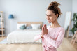 © BestForYou - Close Up portrait of a positive woman prayer Namaste gesture.