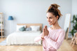 © BestForYou - Close Up portrait of a positive woman prayer Namaste gesture.