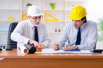 two engineers colleagues working under project