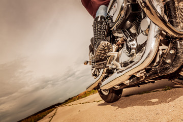 Wall Mural - Biker girl riding on a motorcycle