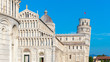 Day view of Pisa Cathedral with Leaning Tower of Pisa on Piazza dei Miracoli in Pisa, Italy