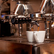 Italian expresso machine with two cups.