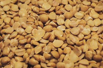 Poster - Сhopped dried peas background. Macro view.