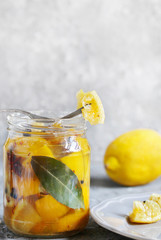 Sticker - salted canned lemons. Preserved lemons with salt. Moroccan cuisine. ferment