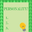 © Artur - Conceptual hand writing showing Personality. Concept meaning combination characteristics that form individuals character Light Bulb with Filament Inside Resting on Blank Color Paper