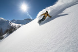 Snowboarder in deep powder, extreme freeride - austria.