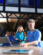 © New Africa - Group of smart medical students with gadgets in college