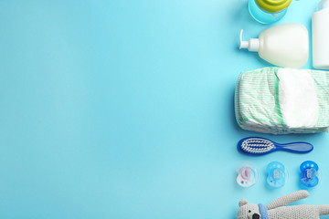 Wall Mural - flat lay composition with baby accessories and space for text on color background