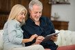 © Minerva Studio - Senior couple using tablet