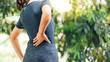 Young Asian women with back pain  , health care concept
