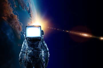 Wall Mural - Astronaut with TV head in space. Mixed media.