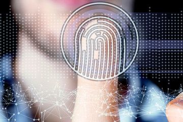 persons hand and 3d finger print hologram in front of him b