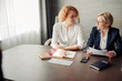 © alfa27 - Two female human resources managers conducting job interview with woman applicant in office. Getting a new job concept