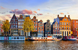 Amsterdam Netherlands dancing houses over river Amstel landmark in old european city spring landscape.