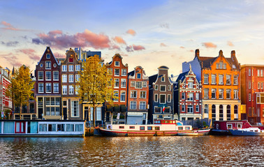 amsterdam netherlands dancing houses over river amstel landmark in old european city spring landscap