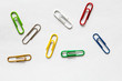 Top view mix colorful paper clips on white background.