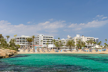 Wall Mural - May 2, 2014: Hotel Adams Beach with the beach on the Mediterranean Sea. Cyprus. Ayia Napa.