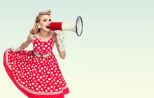 Happy Woman Holding Megaphone, Dressed In Pin-up Style Red Dress