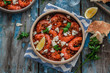 Prawns in tomato sauce with feta cheese, copy space