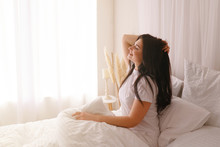 Good Morning, Starting New Day, Lifestyle Concept. Happy Woman Waking Up After Good Sleeping. Beautiful Young Girl Stretch And Relax In Bed After Wake Up Morning At Bedroom