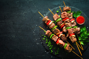 Wall Mural - Grilled meat and vegetables on skewers