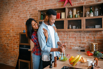 Black man cooking breakfast on the kitchen