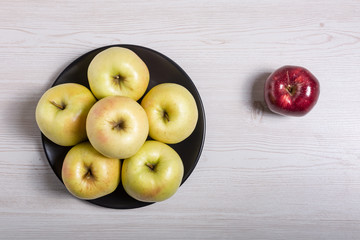 Wall Mural - Raw delicious apples golden on wood background