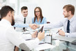 © yurolaitsalbert - handshake of business people at a working meeting.