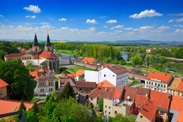 Roudnice nad Labem, town near the river Labe (Elbe) in central Czech Republic. City in sunny day with blue sky and white clouds. Travelling in the centre of Europe.