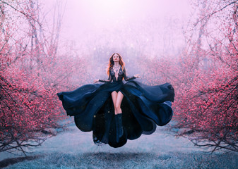 gorgeous red-haired hot woman in long flying black dress fluttering, witch turns into crow, dark que