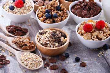 Wall Mural - Bowls with different sorts of breakfast cereal products